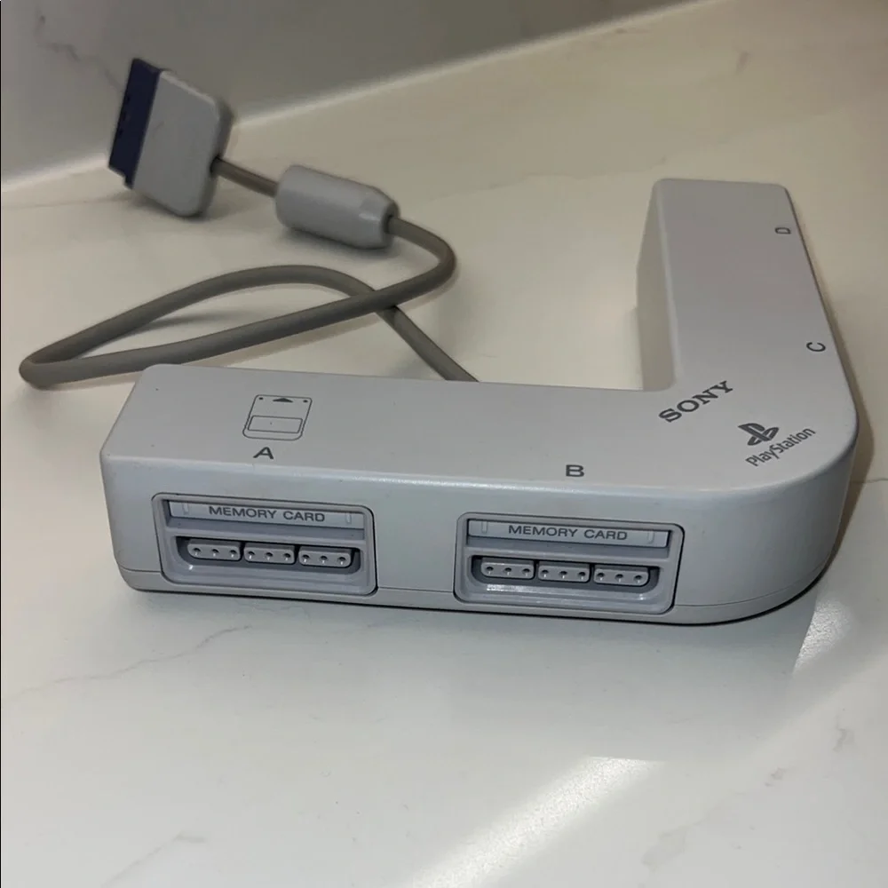 Sony PlayStation Gray Multi-Tap Adapter